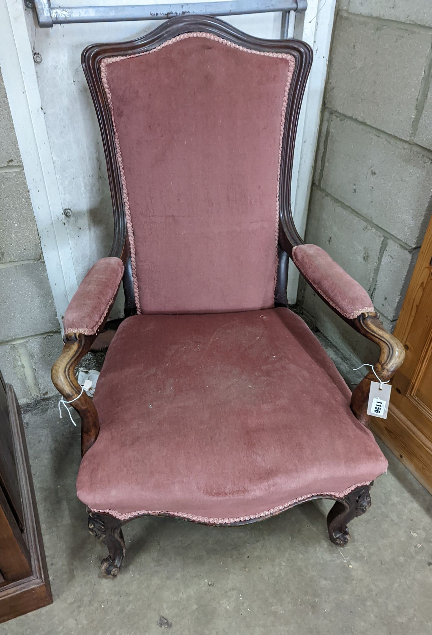 A Victorian mahogany open armchair, width 63cm, depth 70cm, height 94cm